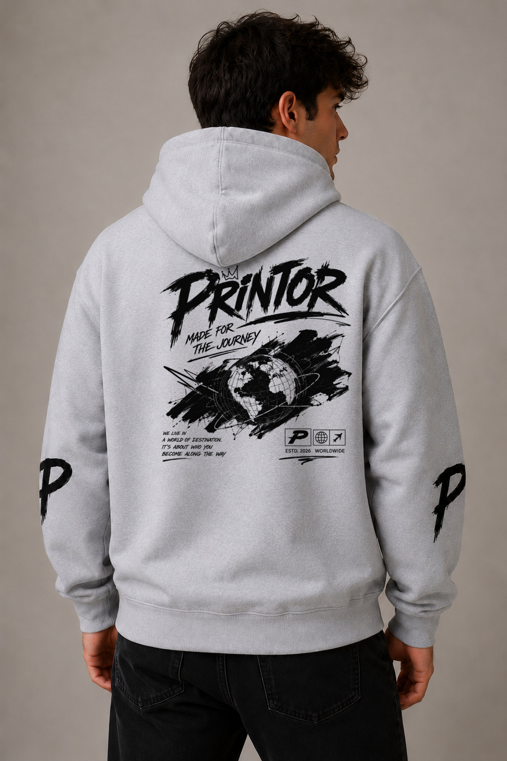 Male model wearing the PRINTOR SJ-001 Globe heavyweight hoodie in Grey Marle, back view showing the centred Globe artwork and sleeve prints.